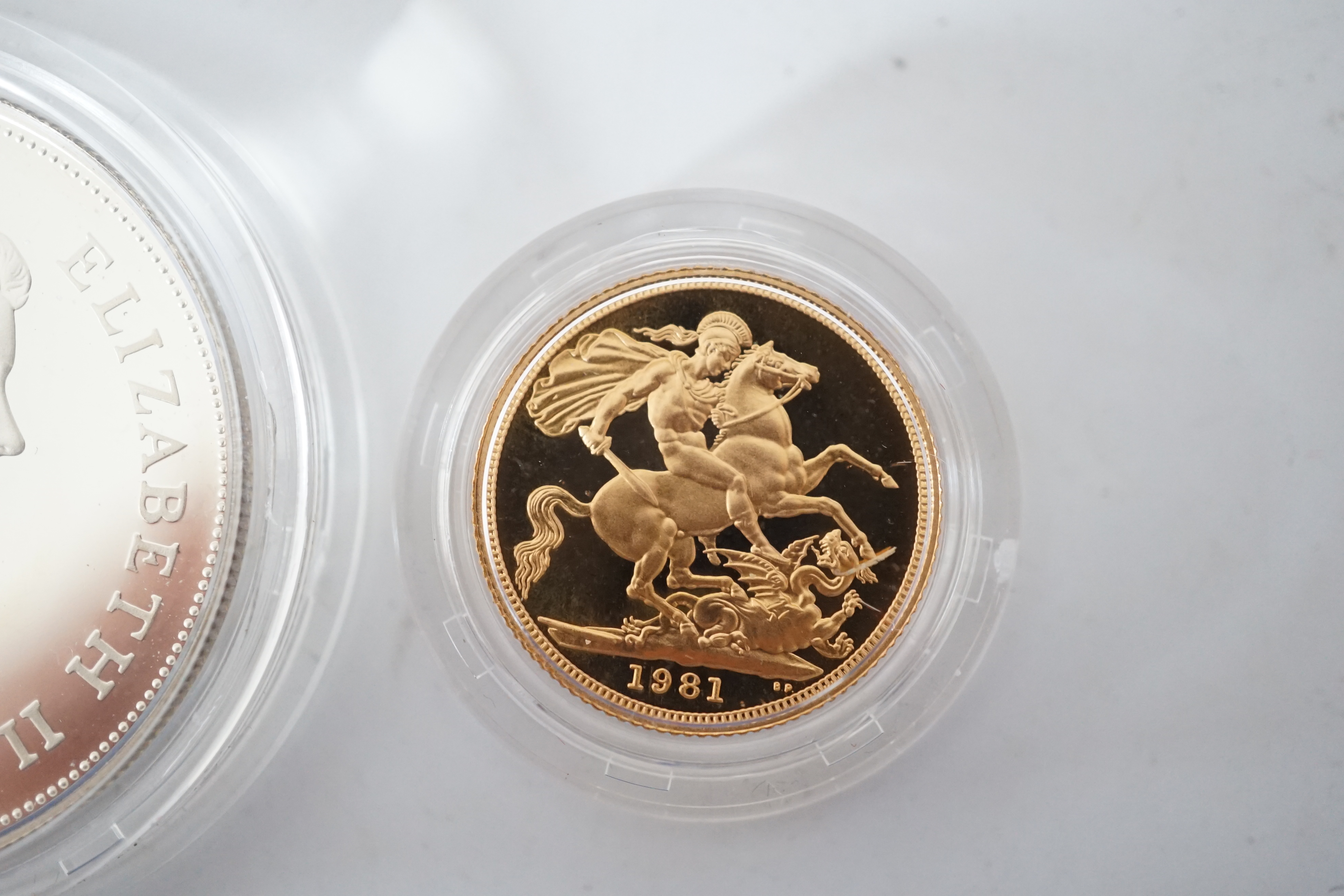 Elizabeth II gold and silver proof coins, Royal Mint UK two coin commemorative set, comprising 1981 proof gold sovereign and Royal Marriage proof silver crown, in case of issue with certificate